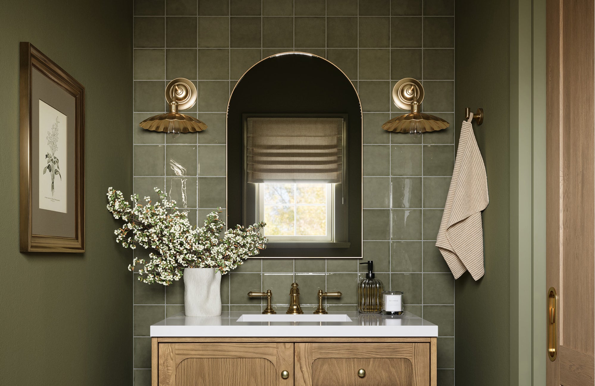 Built-in arched mirror above a 30-inch vanity with green tile backsplash, fitting neatly within the wall frame.
