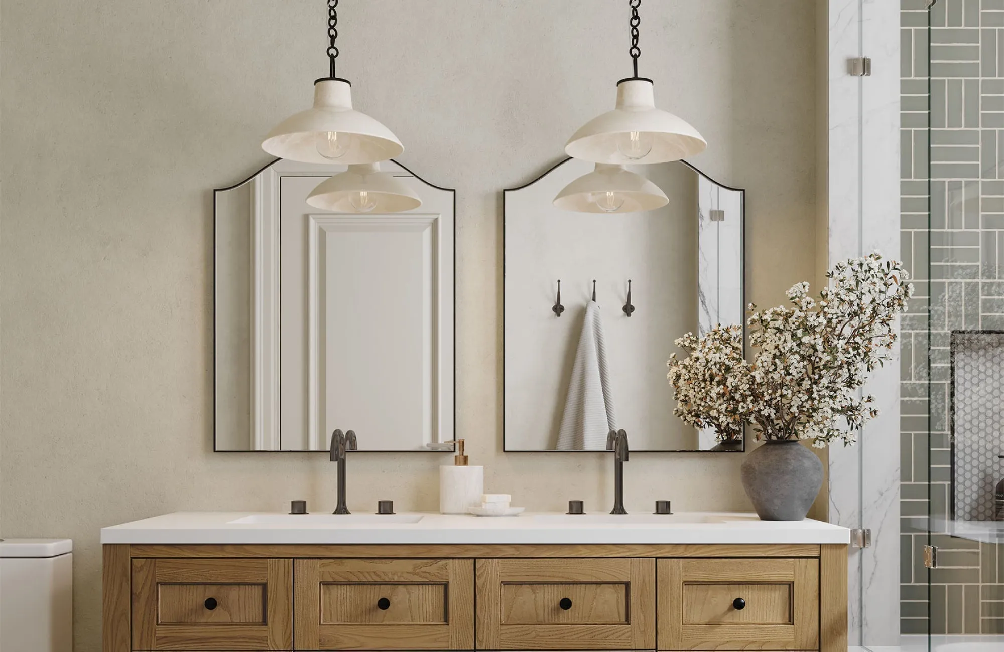 Double mirrors in a master bathroom sized to match a dual vanity, adding balance and symmetry above the sinks.