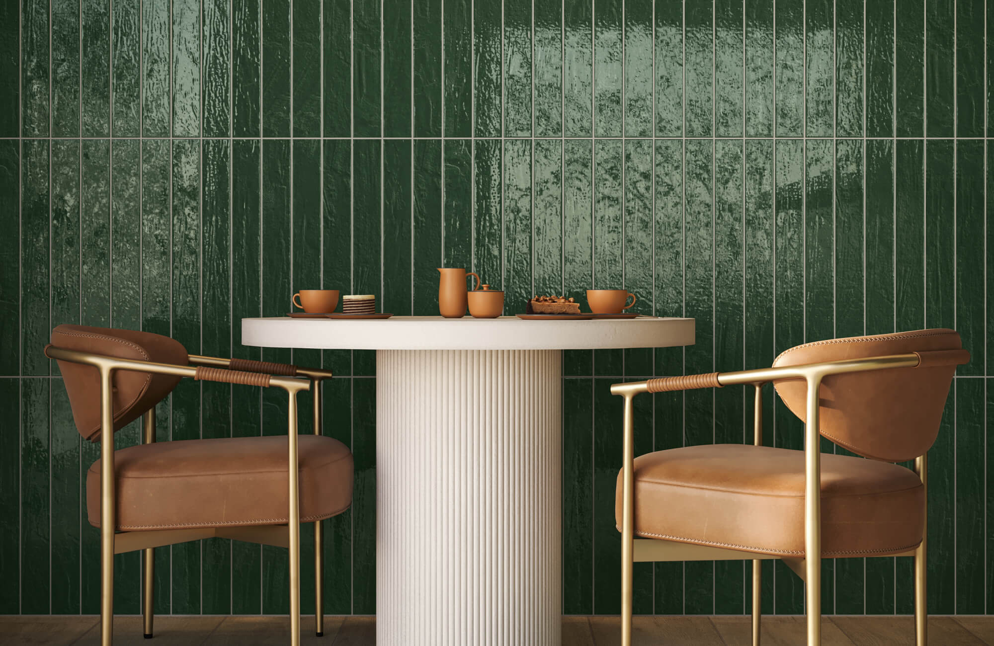 null Glossy dark green subway tile wall in vertical stacked layout behind a round pedestal dining table with tan leather chairs and brass accents.