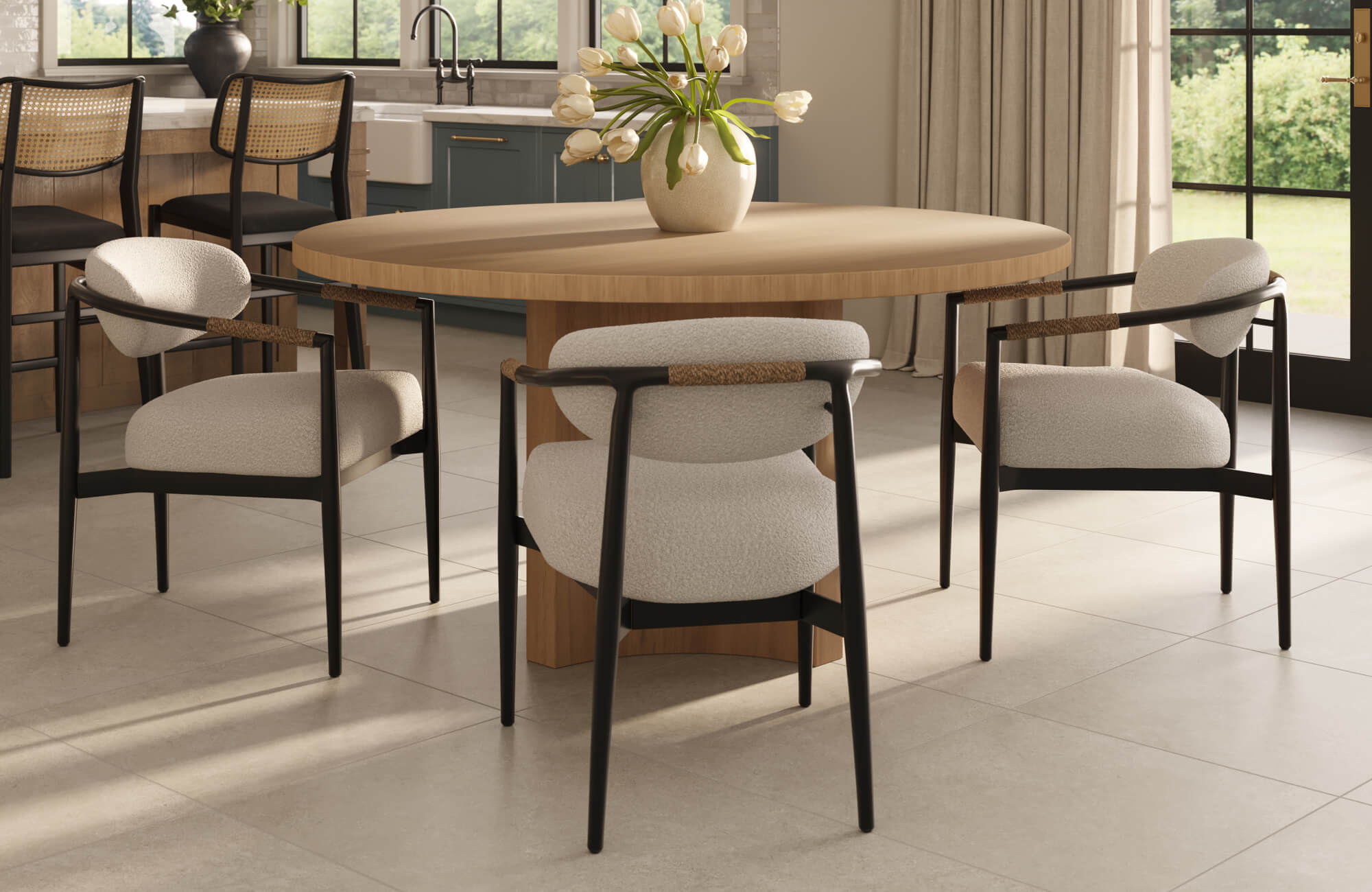 Bright, contemporary dining space featuring a curved dining chair with soft upholstered seating and a sleek black frame, surrounding a warm wood table that enhances the room’s airy, inviting elegance.