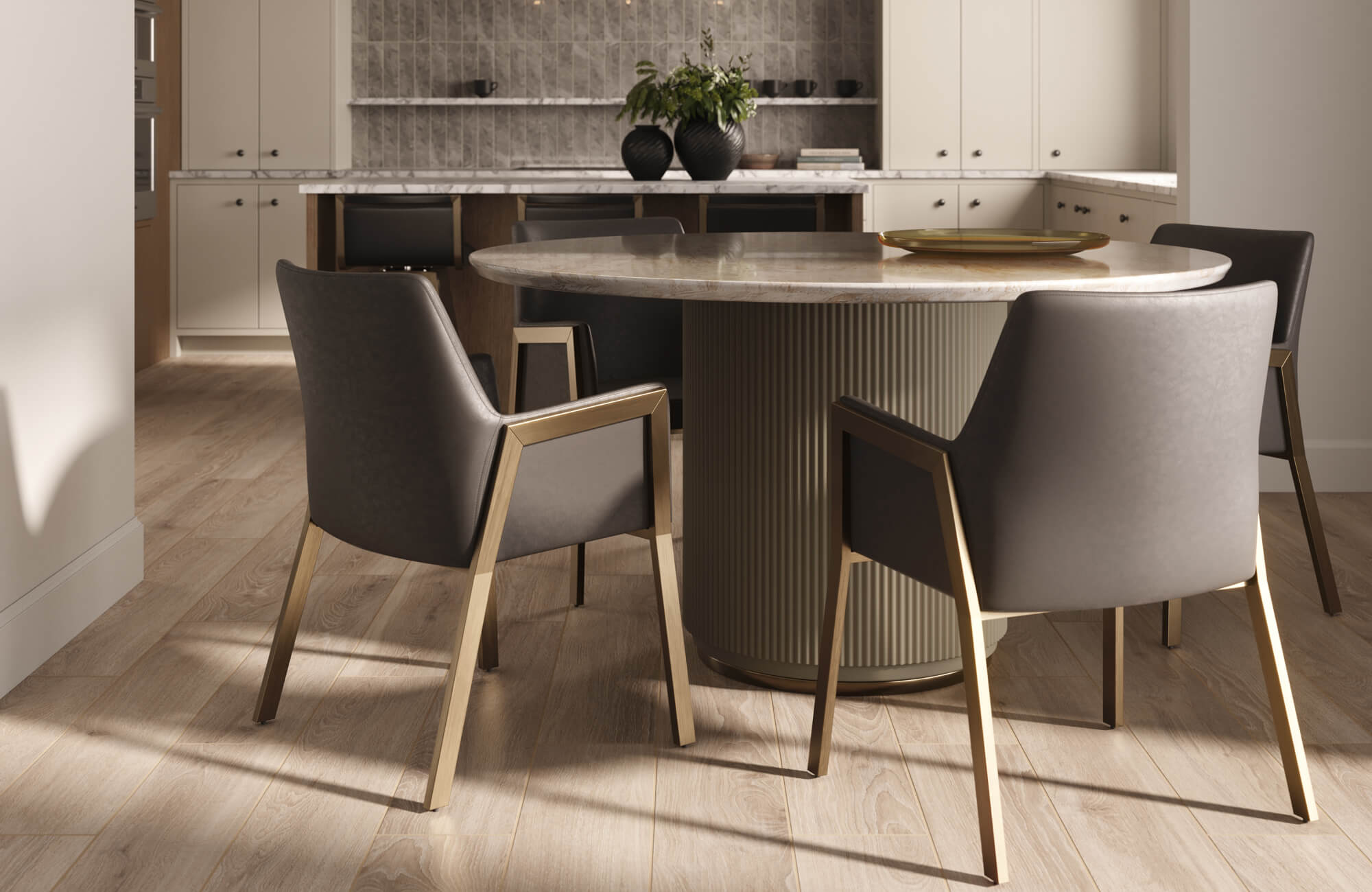 Sophisticated dining area highlighting a refined dining chair with smooth upholstered seating and elegant metal accents, paired with a round stone table to create a warm, modern luxury setting.