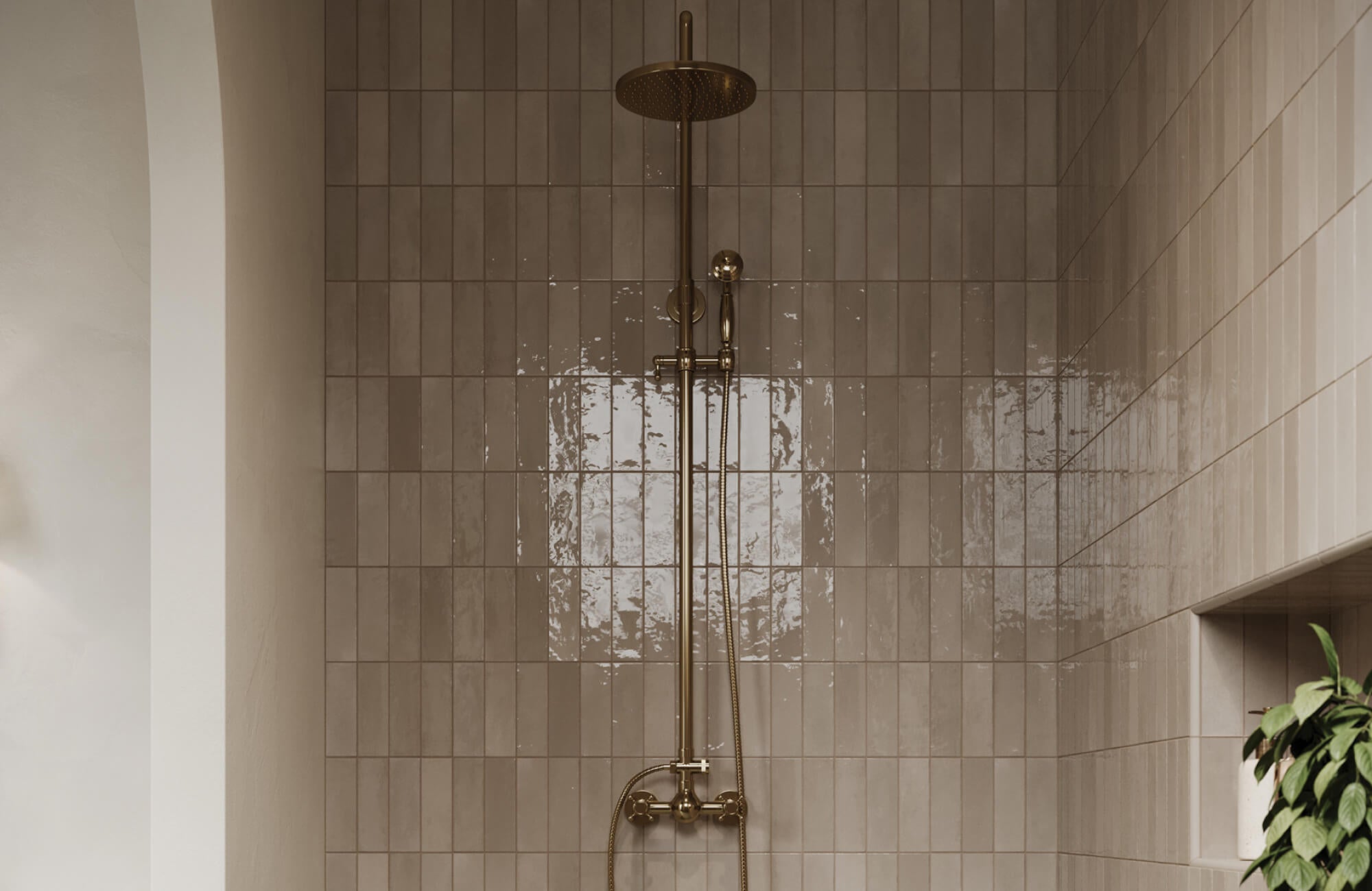 Warm beige shower tiles with subtle tonal variation create a calm surface that helps blend water marks between cleanings.
