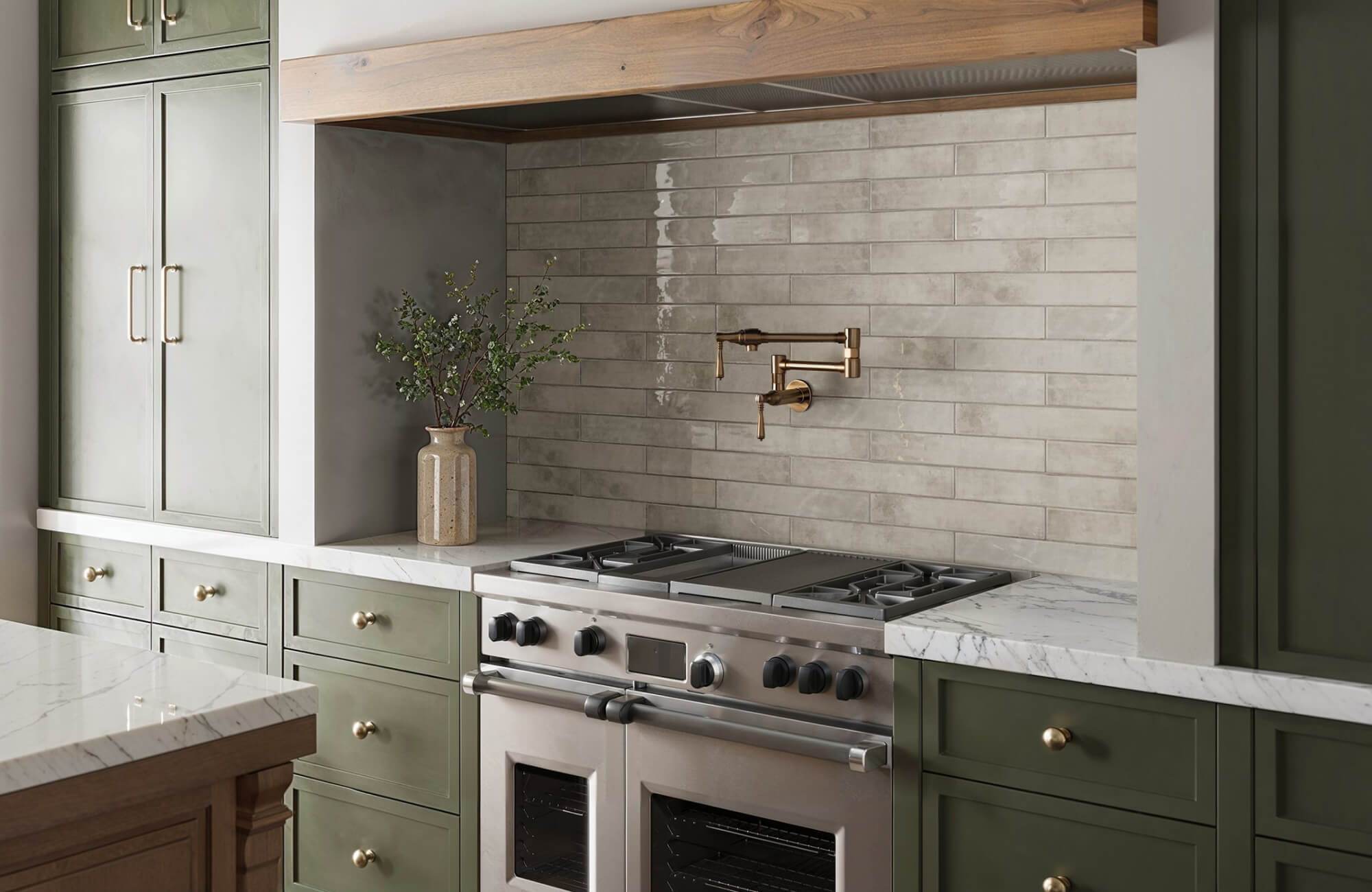 Glossy neutral subway tile backsplash with elongated proportions balancing cabinetry and countertop scale