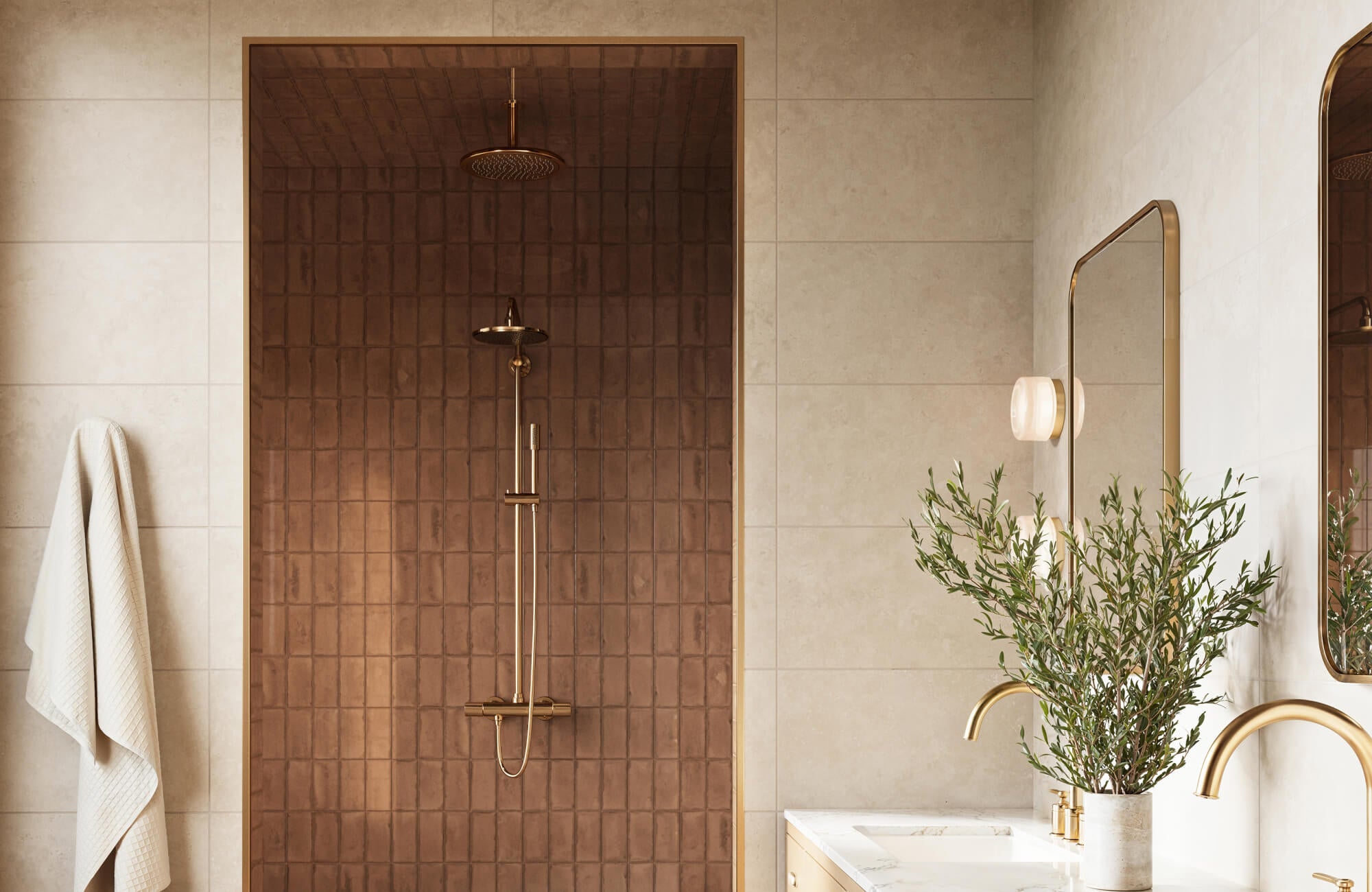 null A luxurious shower nook clad in rich, earthy brown subway tiles contrasts elegantly with soft beige walls and brushed gold fixtures
