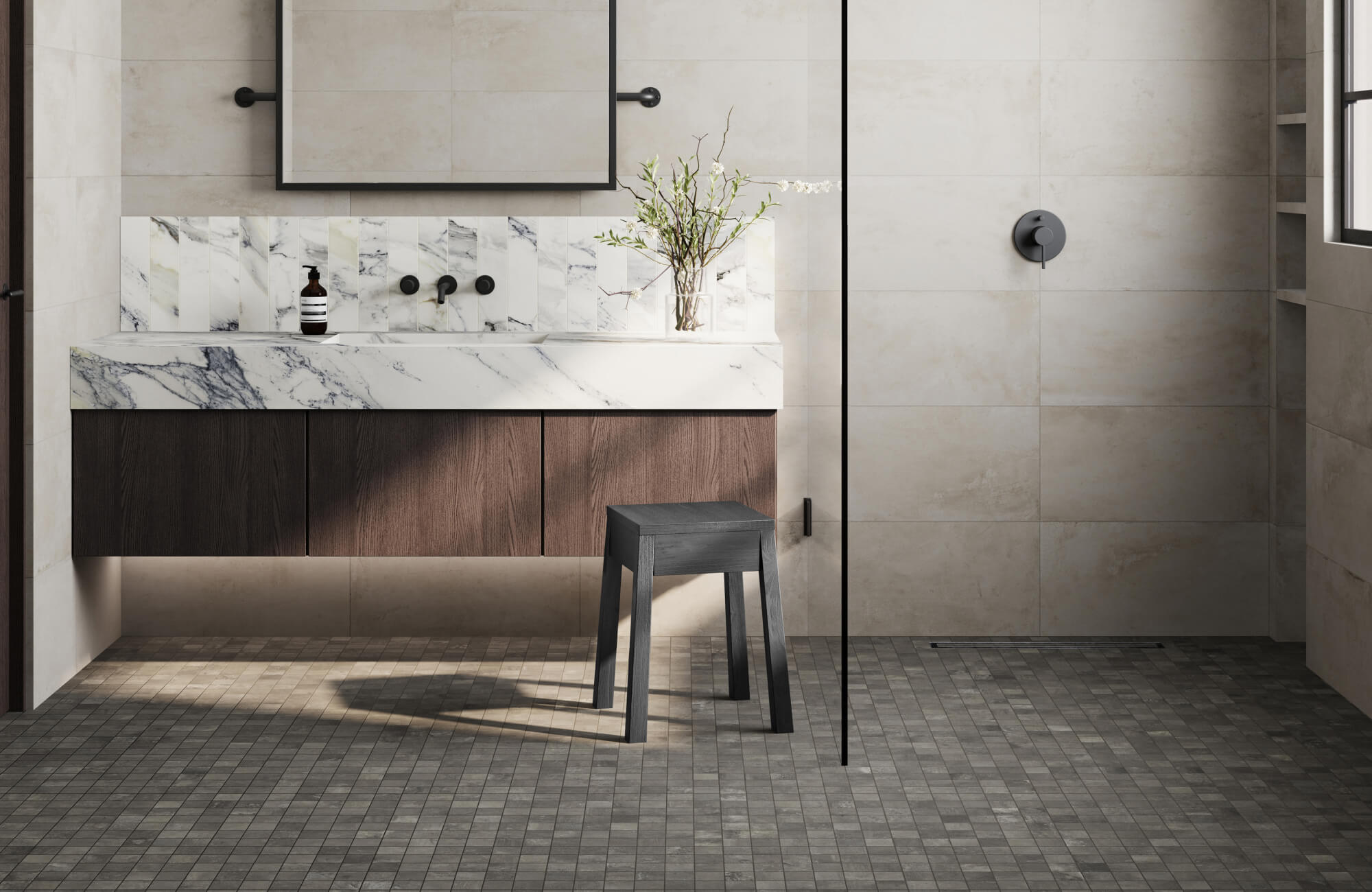 Modern bathroom with soft beige tiles, a floating marble vanity, and a minimalist design, featuring textured floor tiles for added depth and contrast.