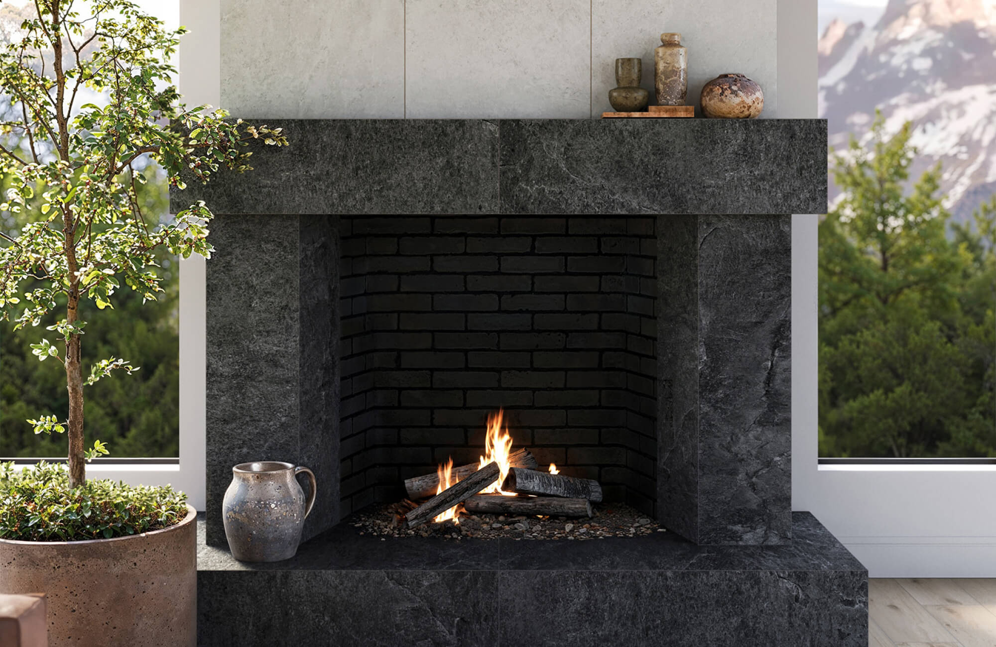Dark stone-look fireplace tiles with subtle veining surrounding a textured black brick firebox.