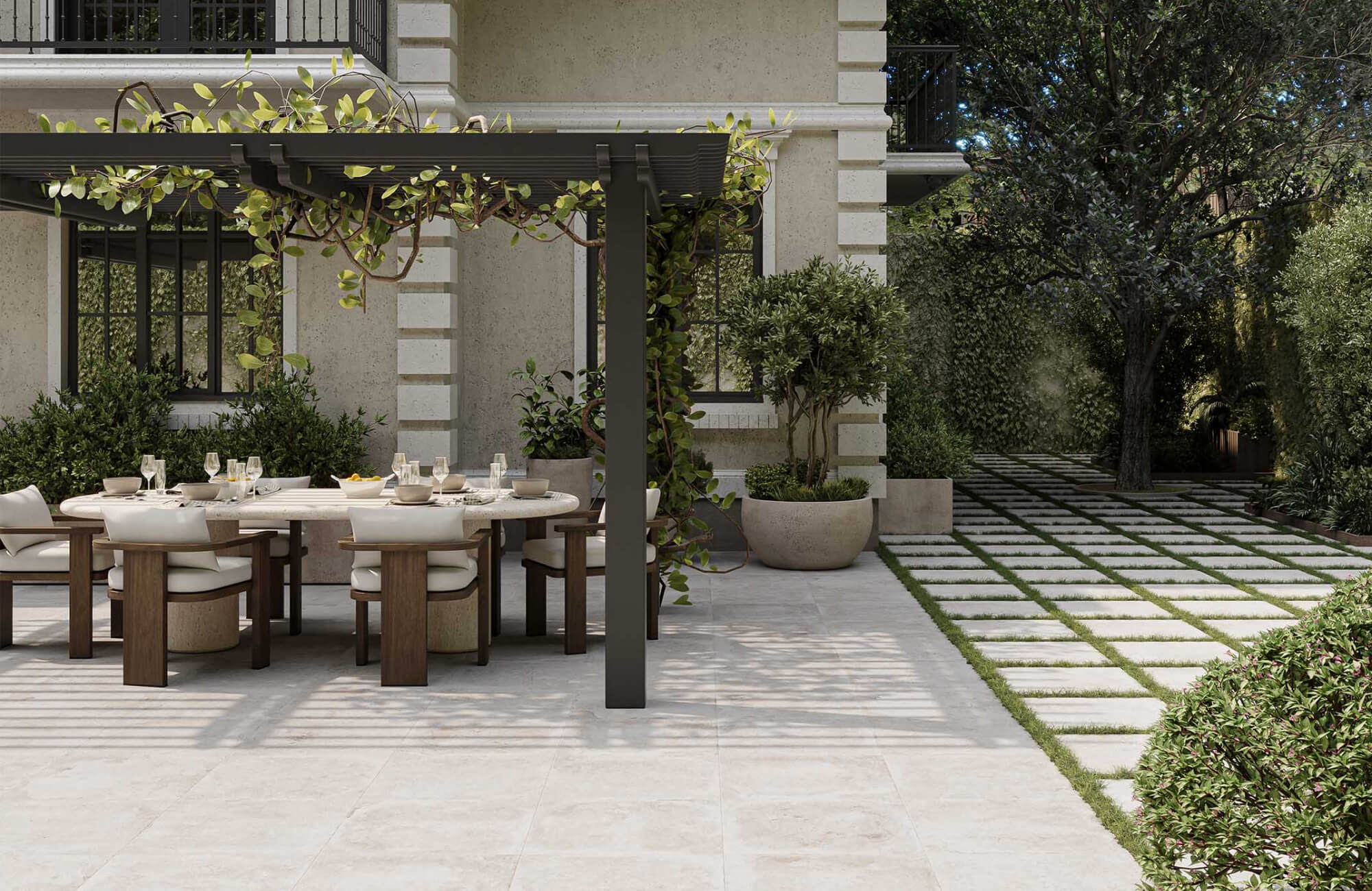 Outdoor dining area under a pergola with tiled flooring and garden pathway, highlighting how layout and surroundings influence furniture selection