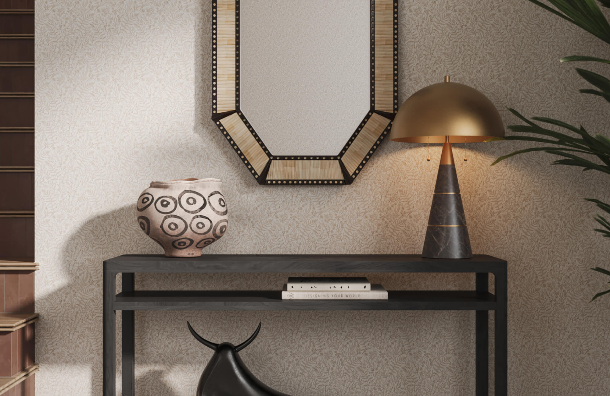 Set beneath a statement mirror, a decorative bowl with bold circular motifs adds artistic character to this entryway, balancing the clean lines of the console and lighting.