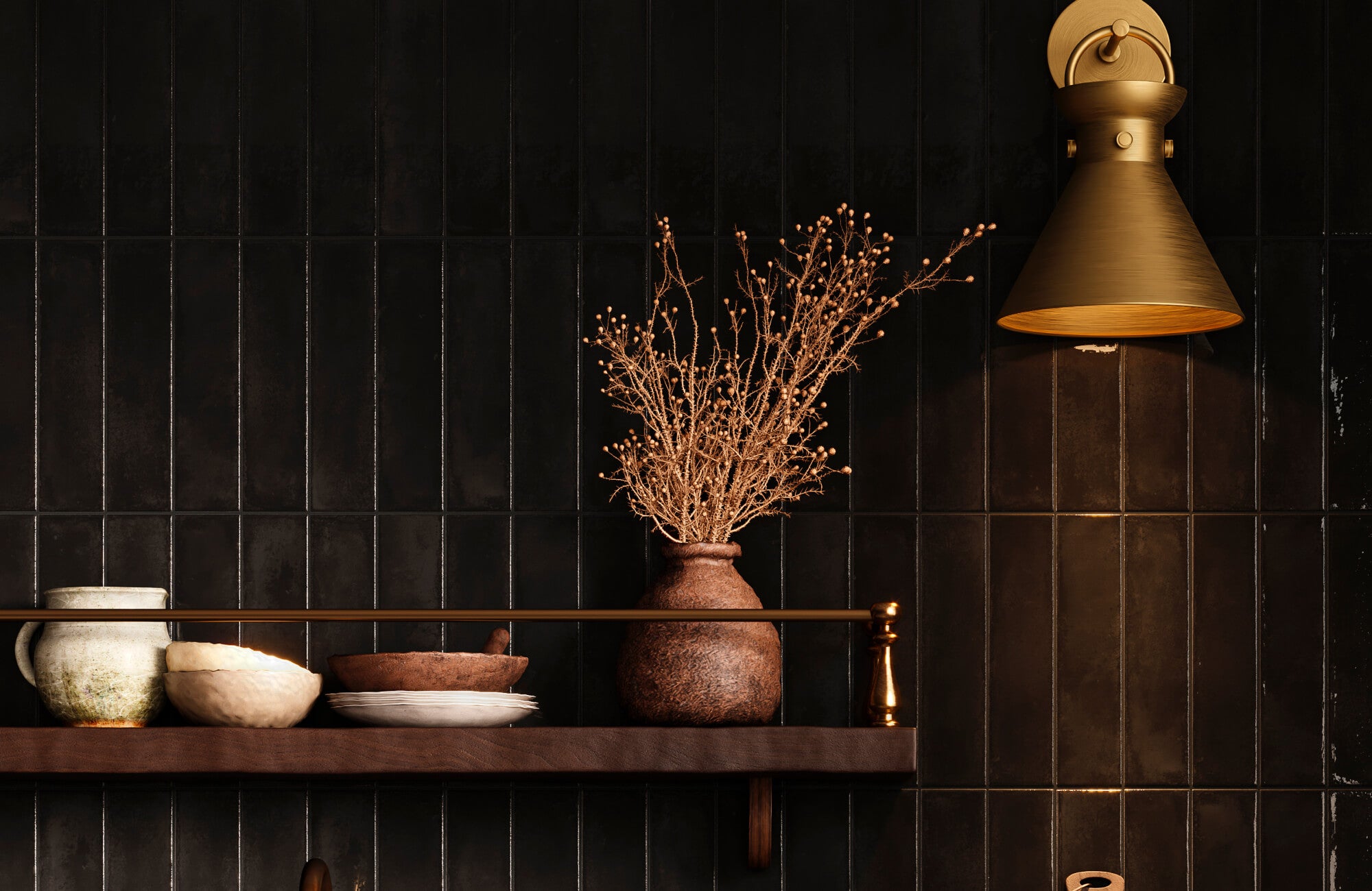 Set against deep black wall tiles, this decorative bowl introduces warm texture and sculptural appeal, helping create a layered and collected display.