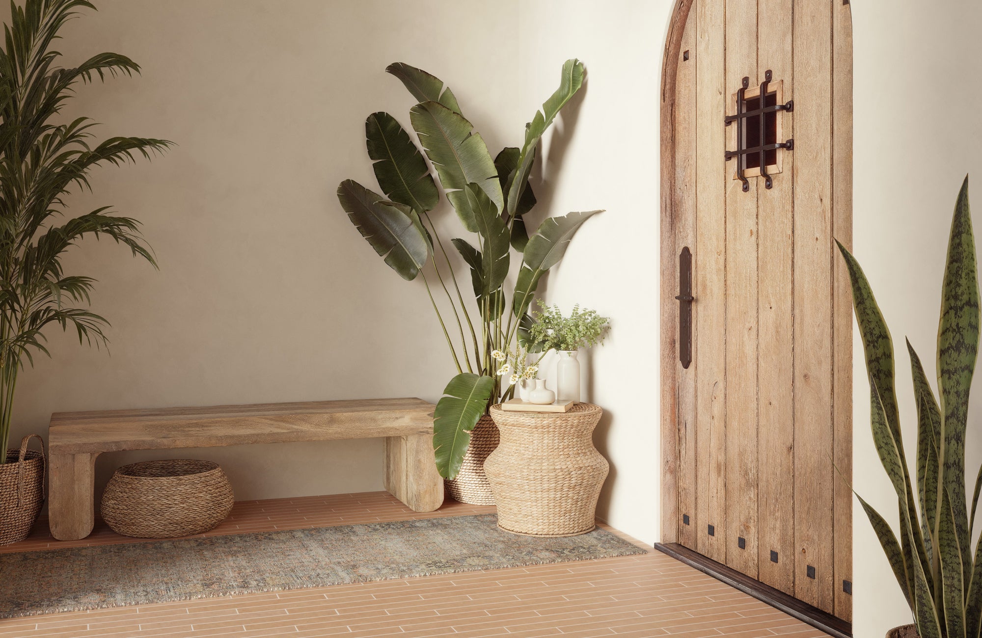 Neutral natural-fiber blend outdoor rug in an entryway, offering durability with a warm and welcoming look.