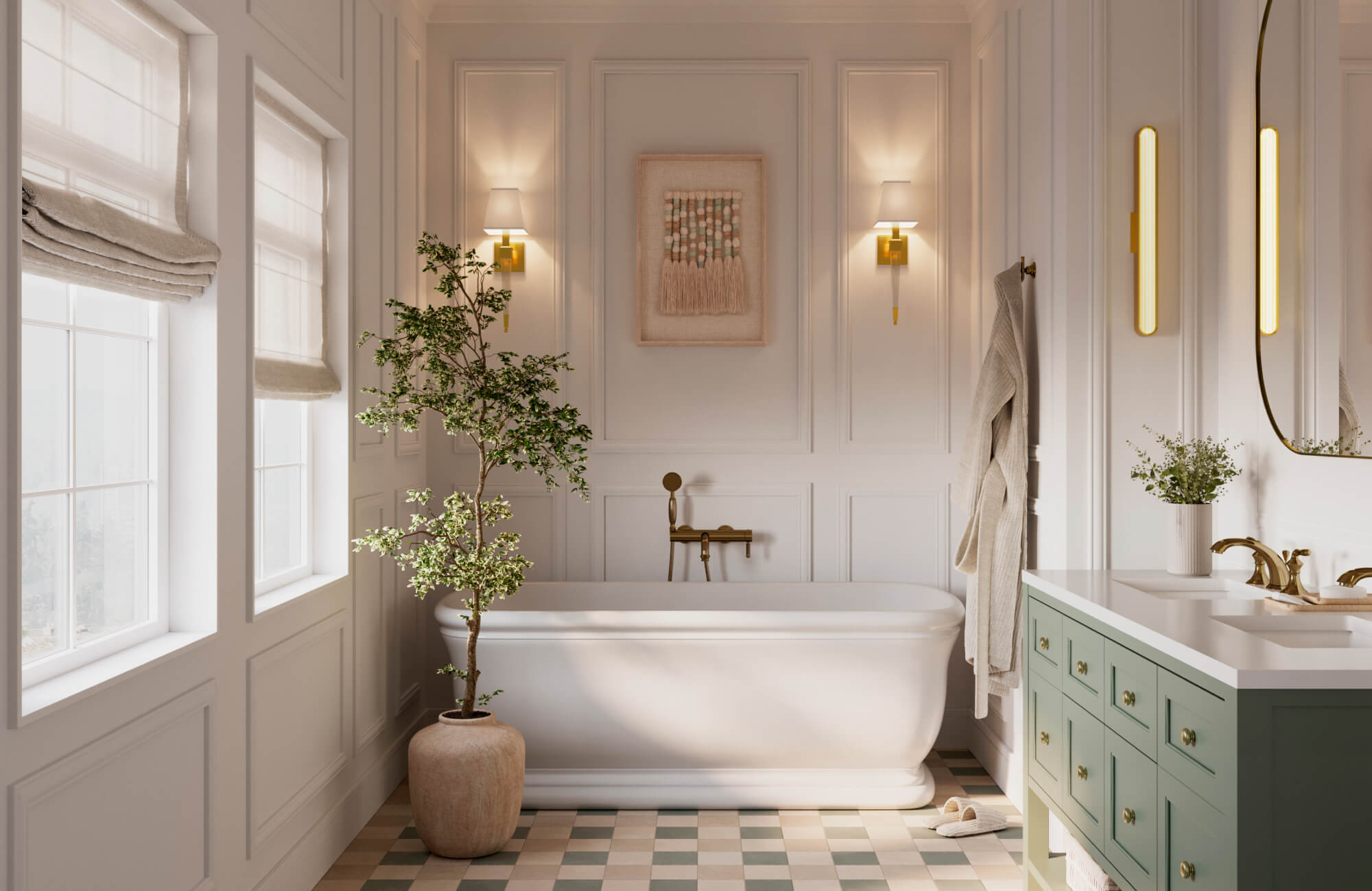 Bright transitional bathroom with paneled white walls, brass sconces, soft textile wall art above a freestanding bathtub, and a sage green double vanity beside checkerboard floor tiles.