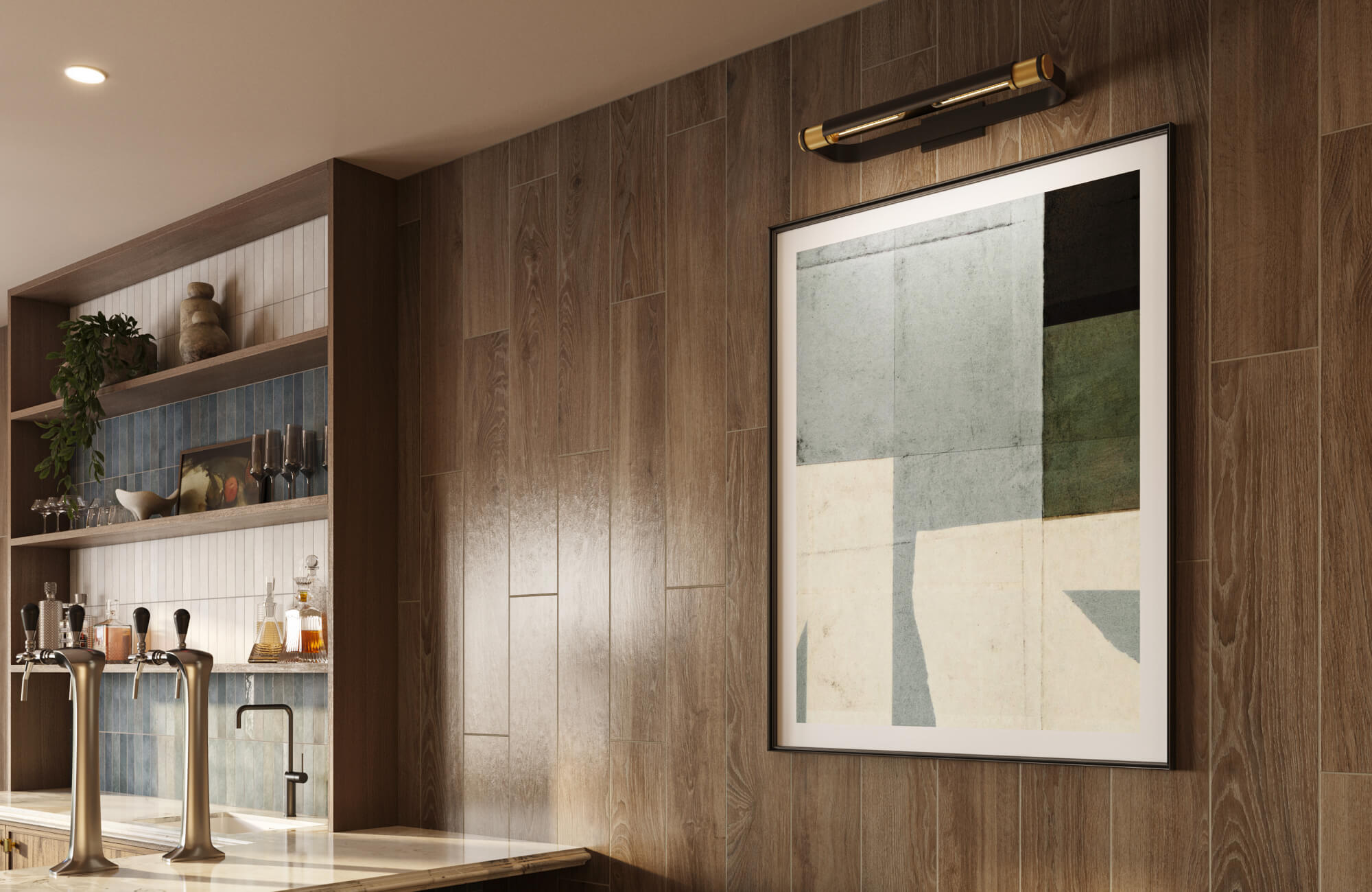 A sleek linear wall light with brass accents is mounted above framed artwork, casting focused illumination that enhances the warm wood-paneled wall and adds a refined, gallery-like ambiance to the space.