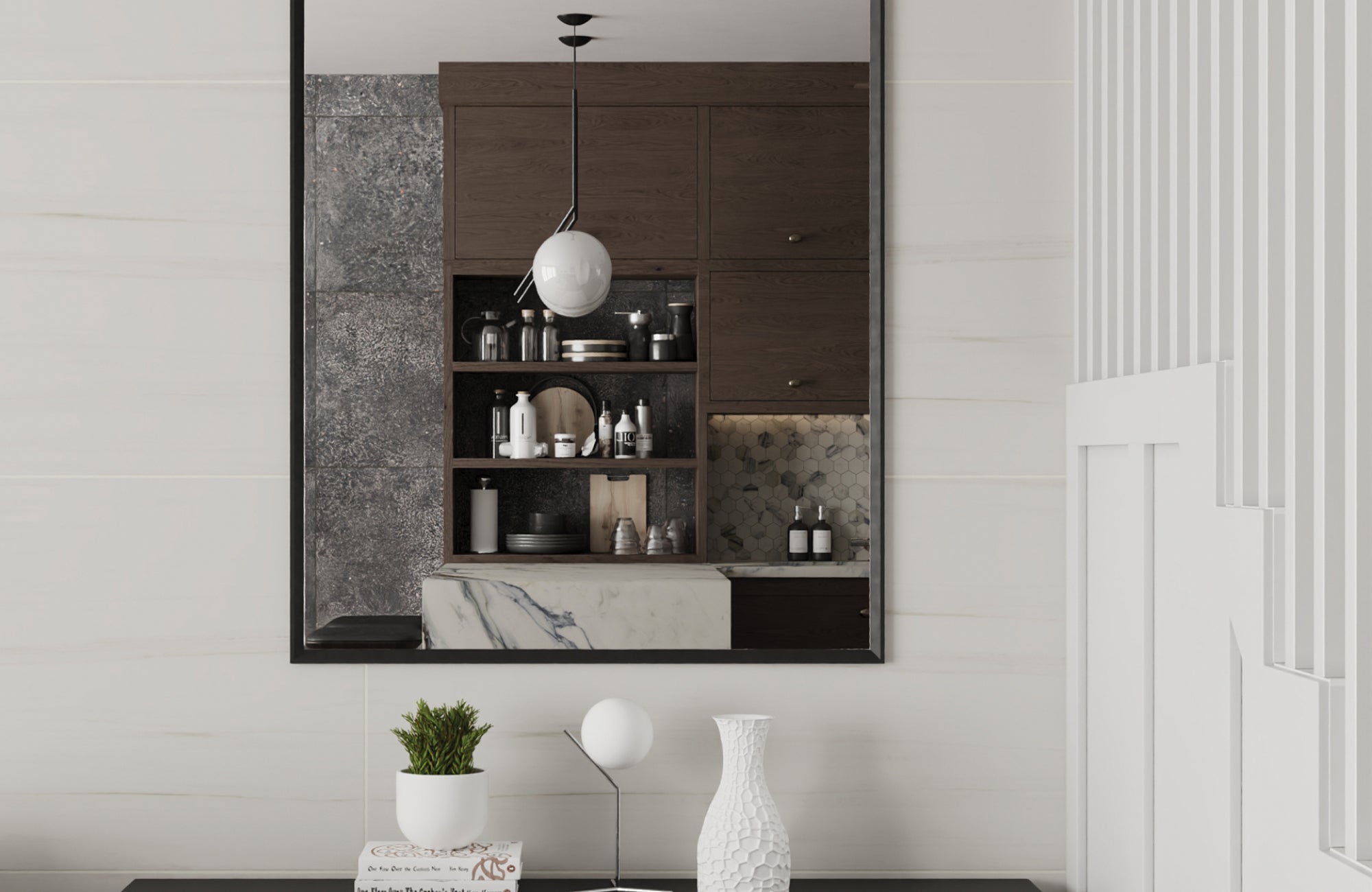 Close-up of a rectangular mirror hung above a console, reflecting shelves and lighting fixtures.