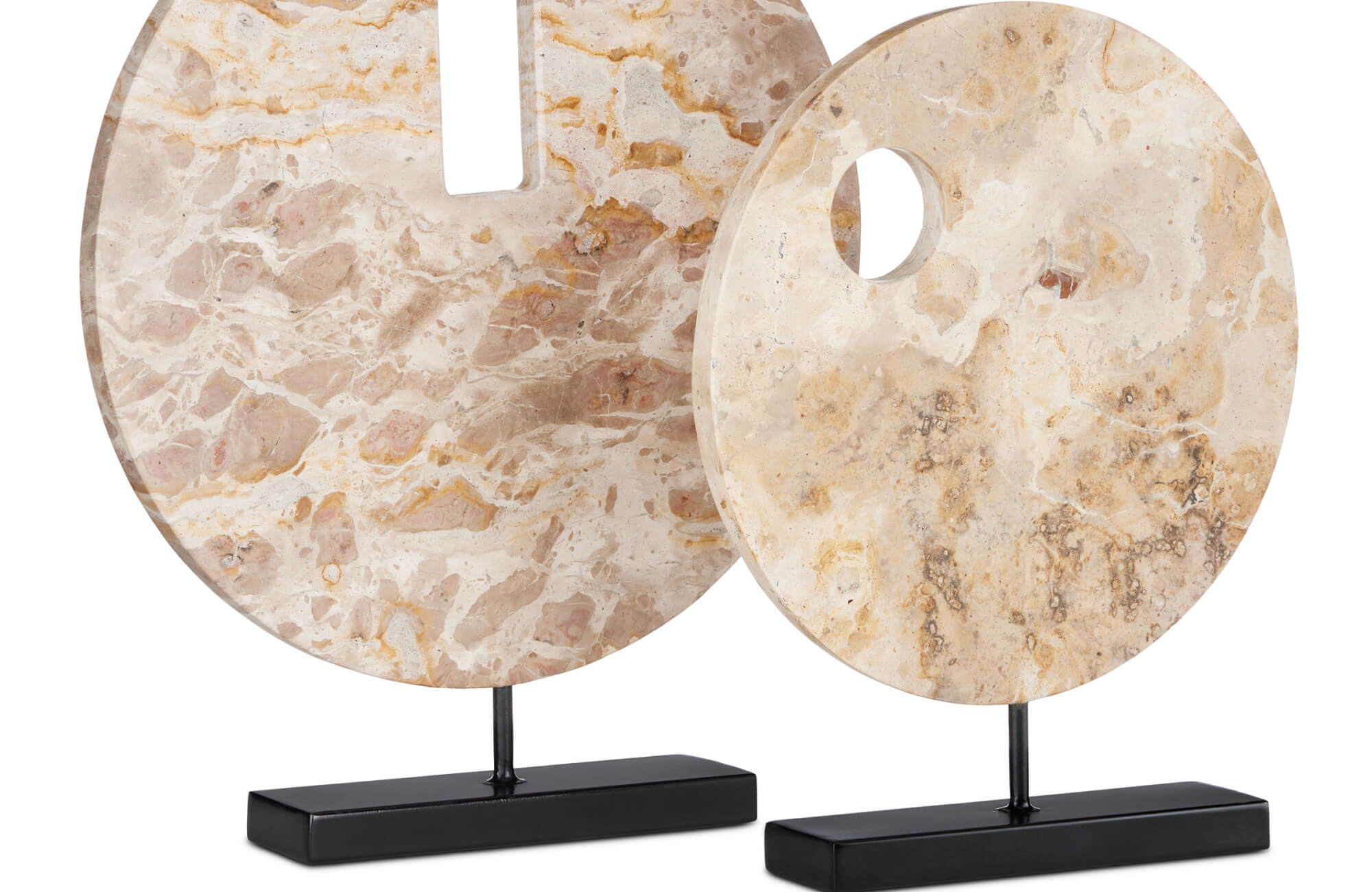 Two large, round marble decorative discs with natural cream, brown, and gold veining, each mounted on a black rectangular stand.