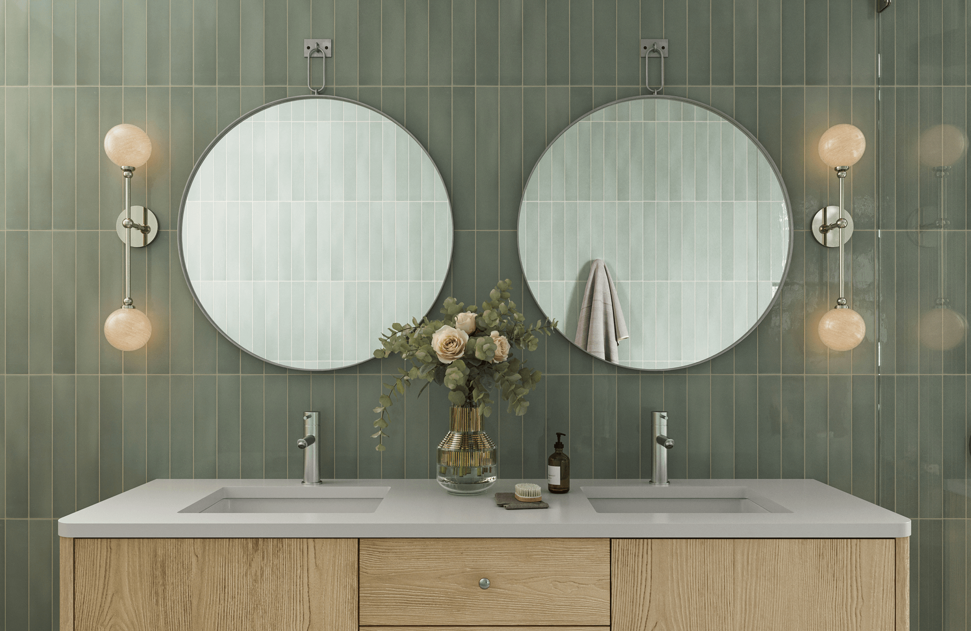 null Modern bathroom with glossy sage green vertical tiles, dual round mirrors, globe sconces, and a light wood double-sink vanity.