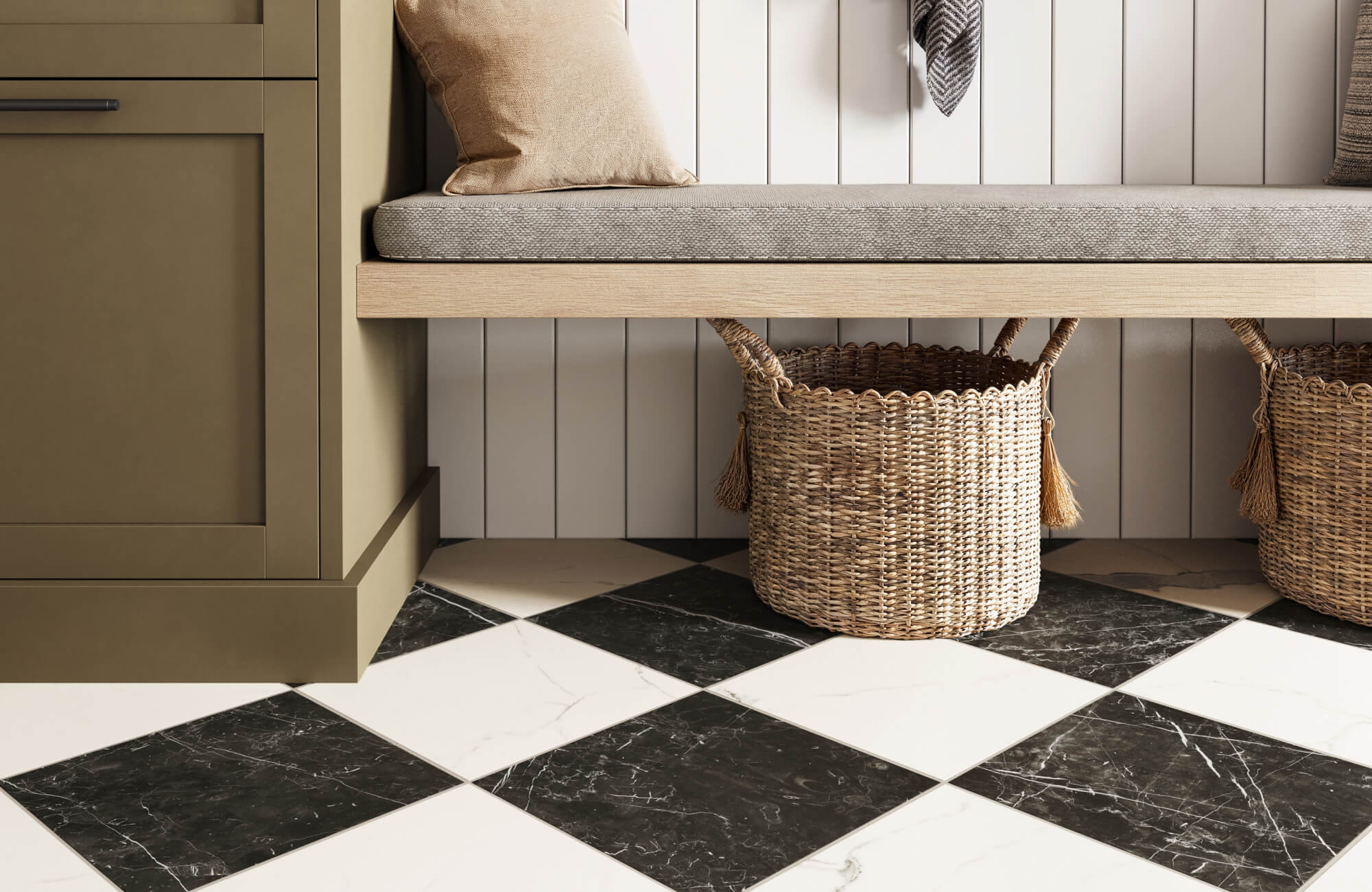null Stylish mudroom corner featuring black and white marble checkered flooring, olive cabinetry, woven baskets, and a cushioned bench that combines functionality with warm, modern elegance.