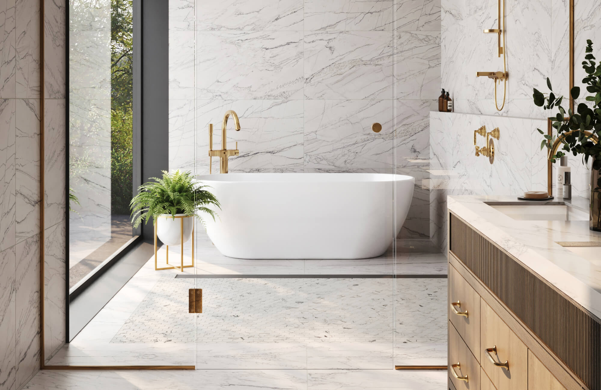 Luxurious bathroom with a freestanding tub, marble walls and floors, gold fixtures, and greenery creating a serene spa-like atmosphere.