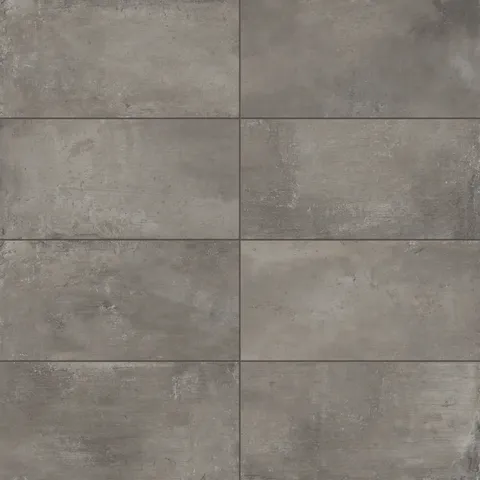12x24 matte porcelain tiles showcasing deep grayish-brown tones and a raw, industrial concrete texture, perfect for contemporary interiors