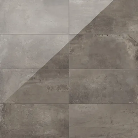 12x24 tiles showcasing a bold dark-toned taupe finish with a high-gloss, polished concrete surface