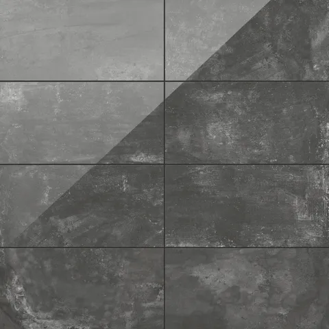 12x24 porcelain tiles in deep dark gray tones with a polished concrete finish, adding bold sophistication to any space