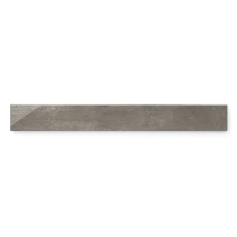 Polished Ramsey 3x24 bullnose tile, featuring a sleek, modern concrete texture for refined wall and floor transitions