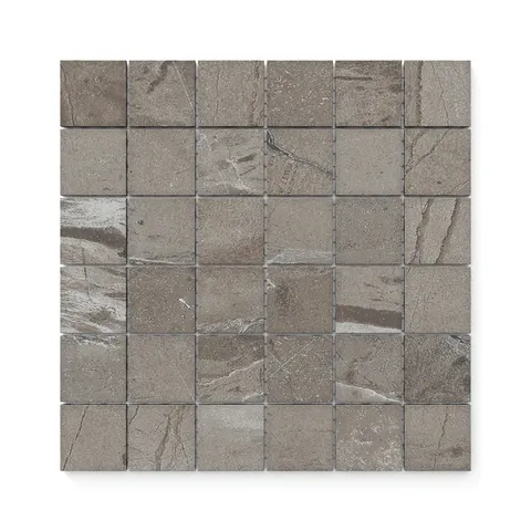 Brown mosaic tiles with a matte, textured surface and soft veining, adding a natural and refined look to walls or floors.