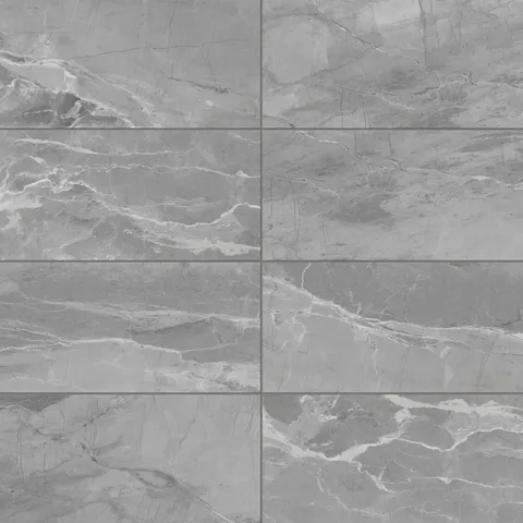 Cool grey matte tiles with fine white veining, offering a sleek and contemporary stone-inspired design.
