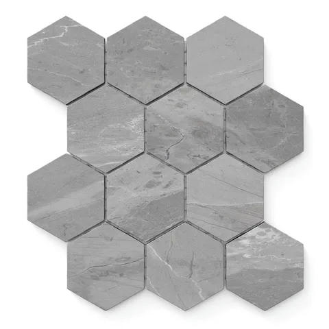Matte hexagonal tiles in a sleek iron grey hue, highlighted by subtle natural veining, bring a refined modern touch.