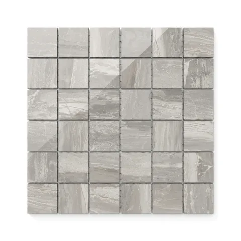 Featuring a polished taupe finish with subtle veining, these 2x2 mosaic tiles offer a refined and modern touch, perfect for a chic design.