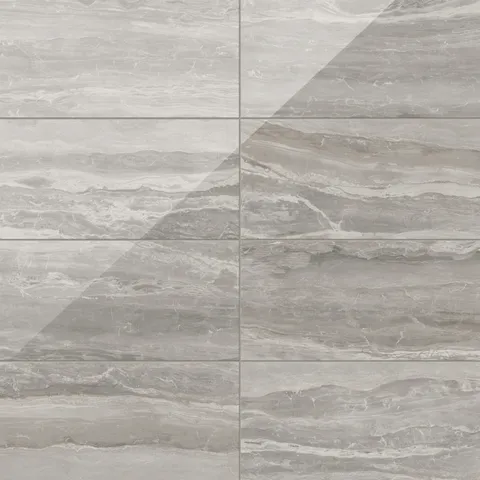 Featuring polished brown surfaces and striking natural veining, these 12x24 tiles combine smoothness and subtle earthy tones, making them ideal for creating a refined and timeless interior style.