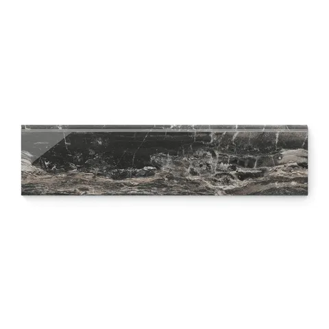 A polished 3x12 bullnose tile showcases brown and dark grey tones and striking veining, offering a sophisticated finish for edge detailing.