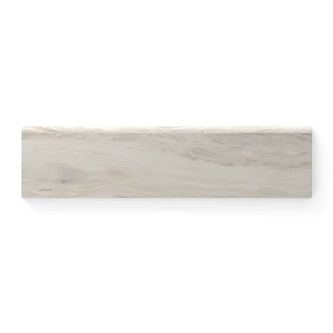 Matte bullnose tile in beige, measuring 3x12, with subtle natural veining, ideal for finishing edges with a clean and seamless look.