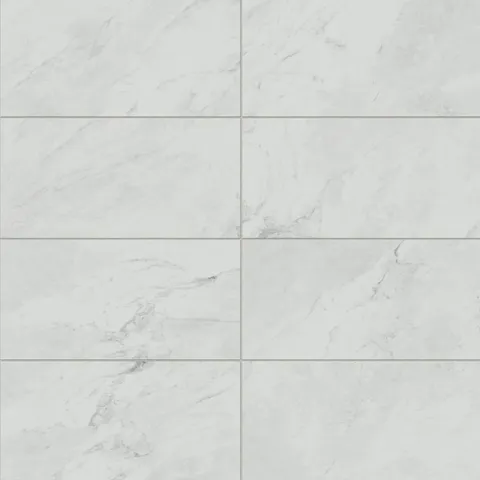 12x24 matte porcelain tiles showcasing soft white and grey marble look veining, perfect for creating a timeless, elegant look.