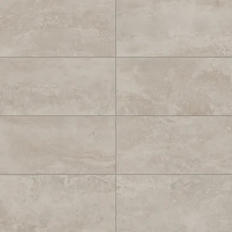 Warm beige industrial-style 12x24 matte porcelain tiles with natural stone textures, ideal for creating a cozy, modern aesthetic