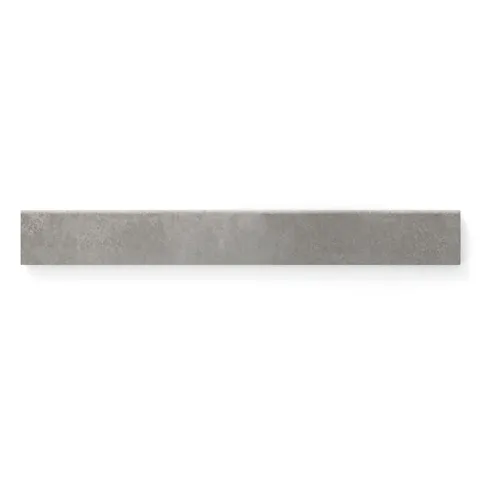 Industrial gray 3x24 matte bullnose tile, perfect for refined edge detailing with a modern, neutral finish