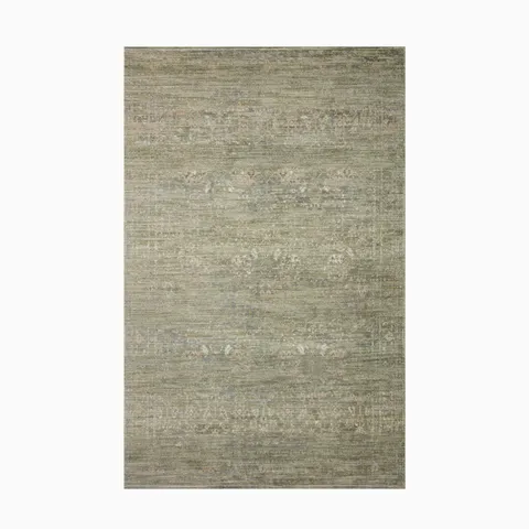 Power-loomed rug made of polyester and polypropylene, featuring a moss green and sand-toned blend for a contemporary, textured appeal.
