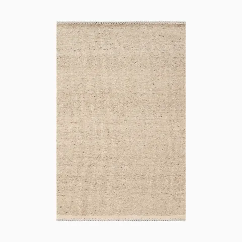 Warm beige handwoven rug made of wool, cotton, and polyester, featuring a finely textured, fabric-like surface and subtle speckled details for a natural, organic feel.