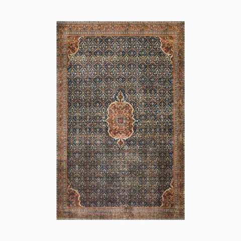 Elegant Persian-style power loomed rug made of polyester, featuring a detailed navy blue field with a central rust-colored medallion and ornate floral motifs.
