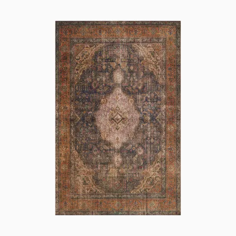 Polyester face rug in terracotta and multi-tones, power-loomed for durability, showcasing a vintage-inspired pattern with a rich, timeworn appeal.