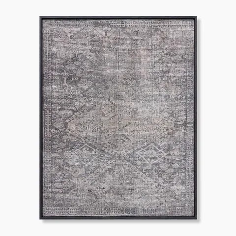 Framed wall art featuring layered geometric and tribal-inspired patterns in warm taupe and ashy gray tones, with subtle chevrons, angular symbols, and softened medallion forms that fade together for a timeworn, textured appearance.