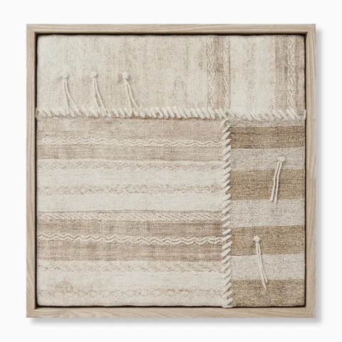 Textile wall art featuring layered woven panels with tonal striping, fine wave details, and softly fringed edges in warm neutrals.