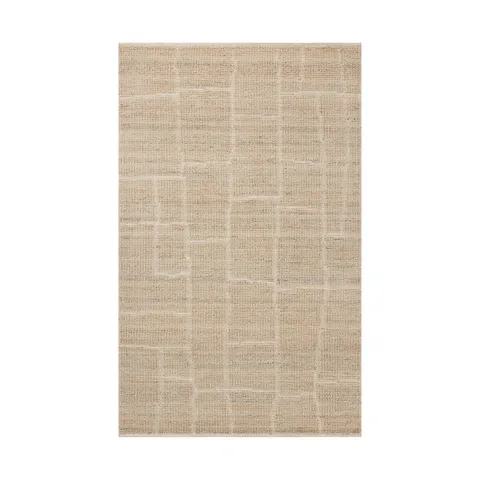 Hand-loomed from a GoodWeave-certified wool-cotton blend, this rug features a warm beige tone with abstract rectangular lines formed through a flattened weave.