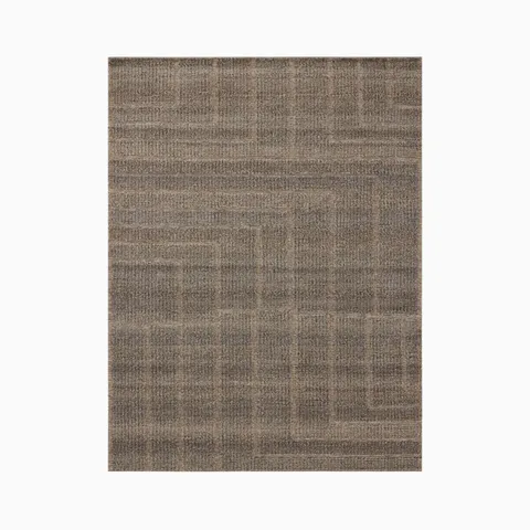 Woven from an eco-friendly blend of wool, cotton, and polyester, this 7'9" x 9'9" rug features a brown surface with soft tonal shifts and angular lines forming a geometric pattern.