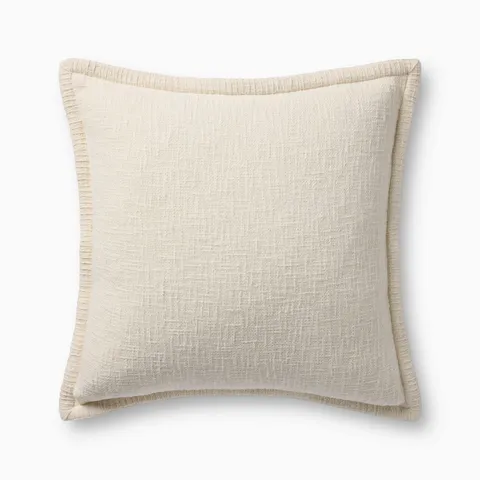 This off-white pillow features a subtle woven texture, matching whipstitched flange edges, and an antique bronze zipper concealed behind a tailored flap.