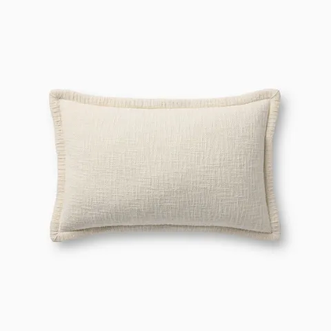 An off-white pillow with a subtly textured weave, finished with matching whipstitching along the flange edge and an antique bronze zipper tucked neatly behind a tailored flap for a light cotton touch.