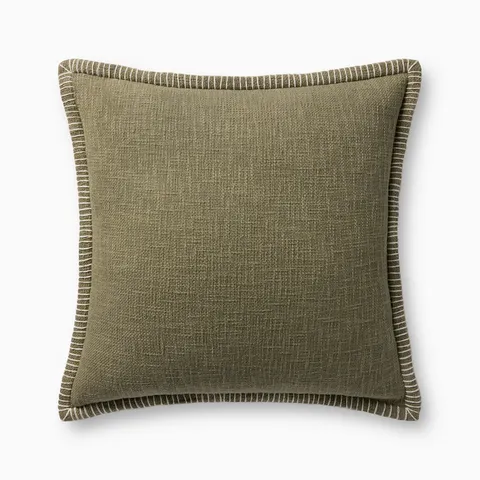 A soft olive green pillow with woven texture, white whipstitched flange edges, and an antique bronze zipper concealed by a tailored flap, finished with a light, breathable cotton feel.
