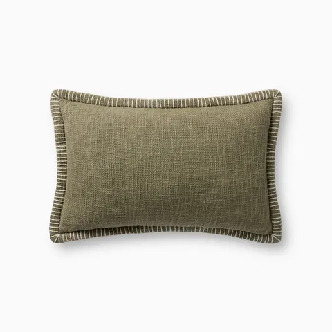A soft olive green pillow with woven texture, white whipstitched flange edges, and an antique bronze zipper concealed by a tailored flap, finished with a light, breathable cotton feel.