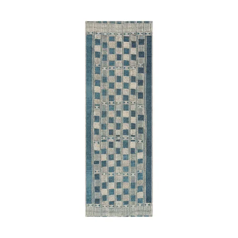 Narrow runner rug featuring a geometric checker pattern with vertical banding, woven in shades of blue-green and soft ivory, offering a textured, elongated design ideal for hallways or entryways.