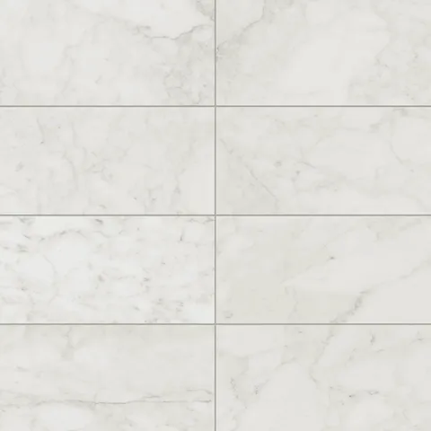 Matte Carrara Bianco porcelain marble look tile in 12x24 format, featuring light grey veining on a bright white base for a classic, versatile design.