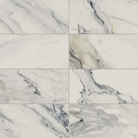 Matte Calacatta Antico porcelain marble look tile in 12x24 format, showcasing dynamic blue, light grey, and gold veining for a refined and modern look.